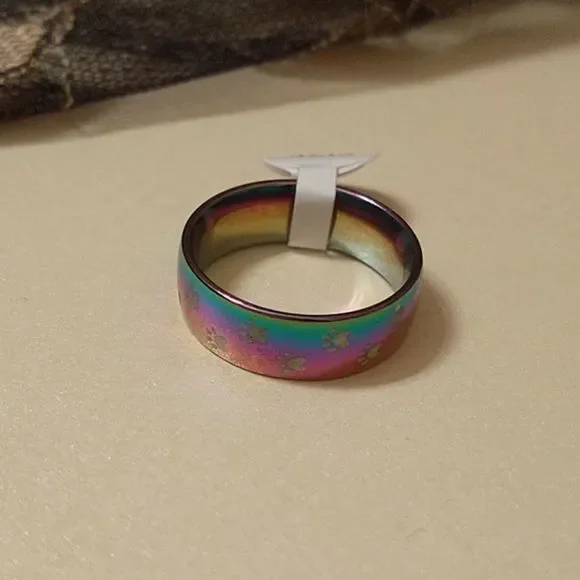 🎈3/$12 Iridescent Paw Print Band Ring! - Picture 1 of 4